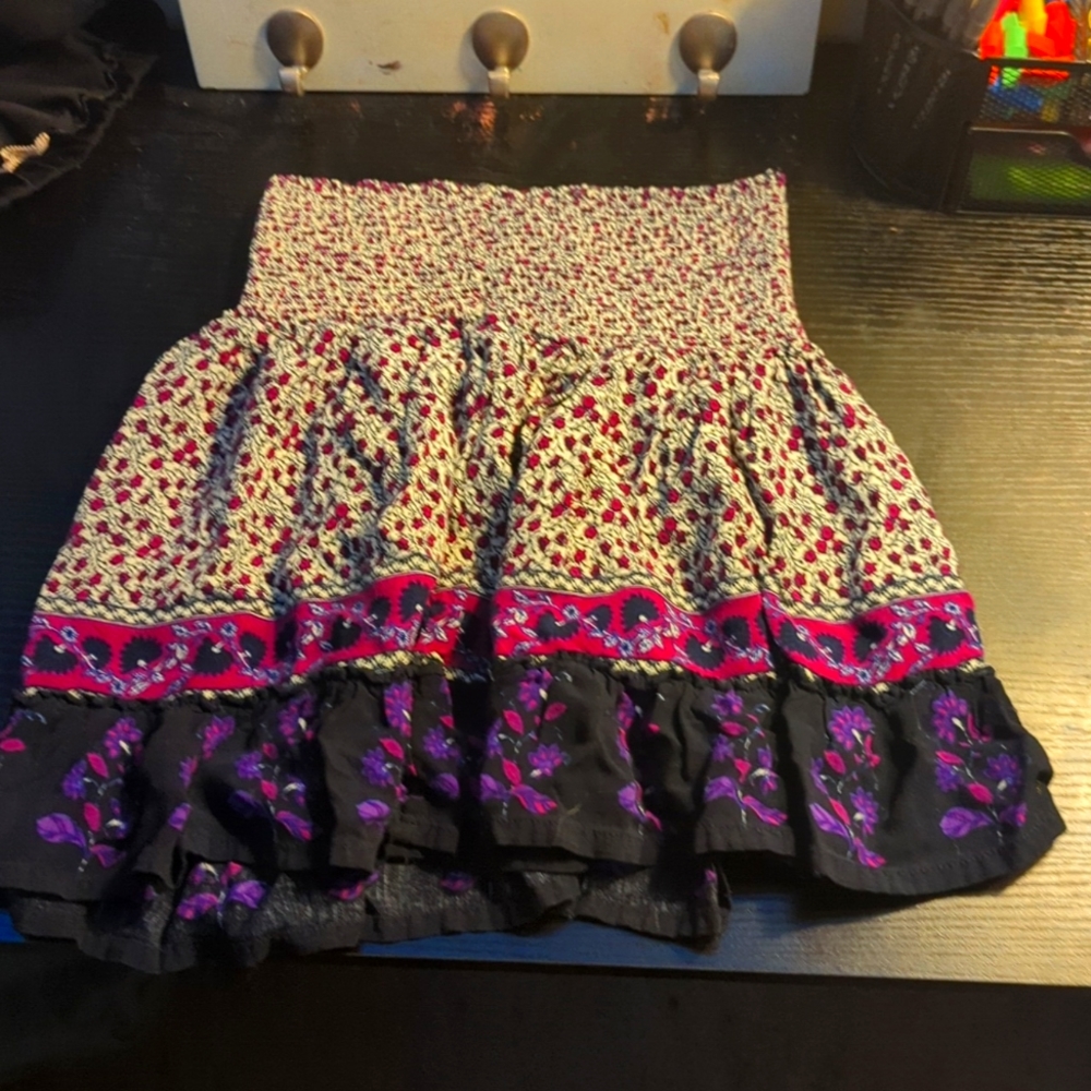 White and black skirt with purple floral design